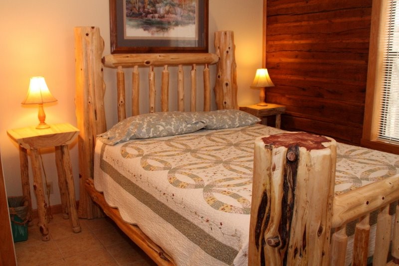 Custom  cedar log queen bed frame and country quilt 